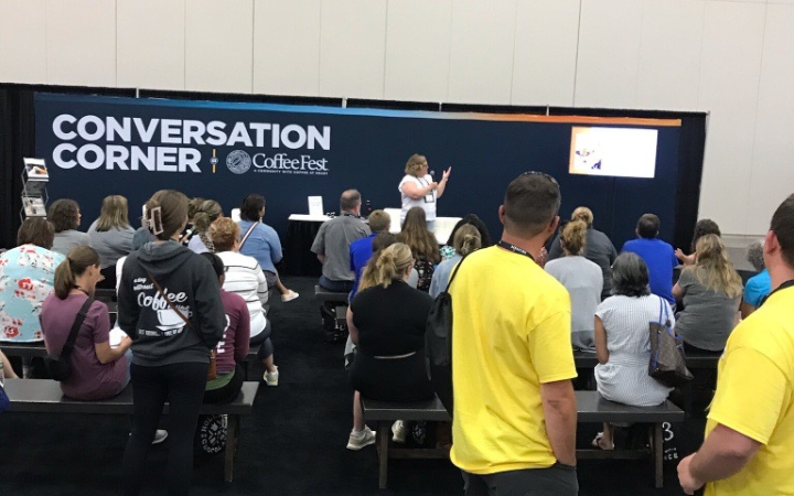 Attendees at a Coffee Fest conversation corner