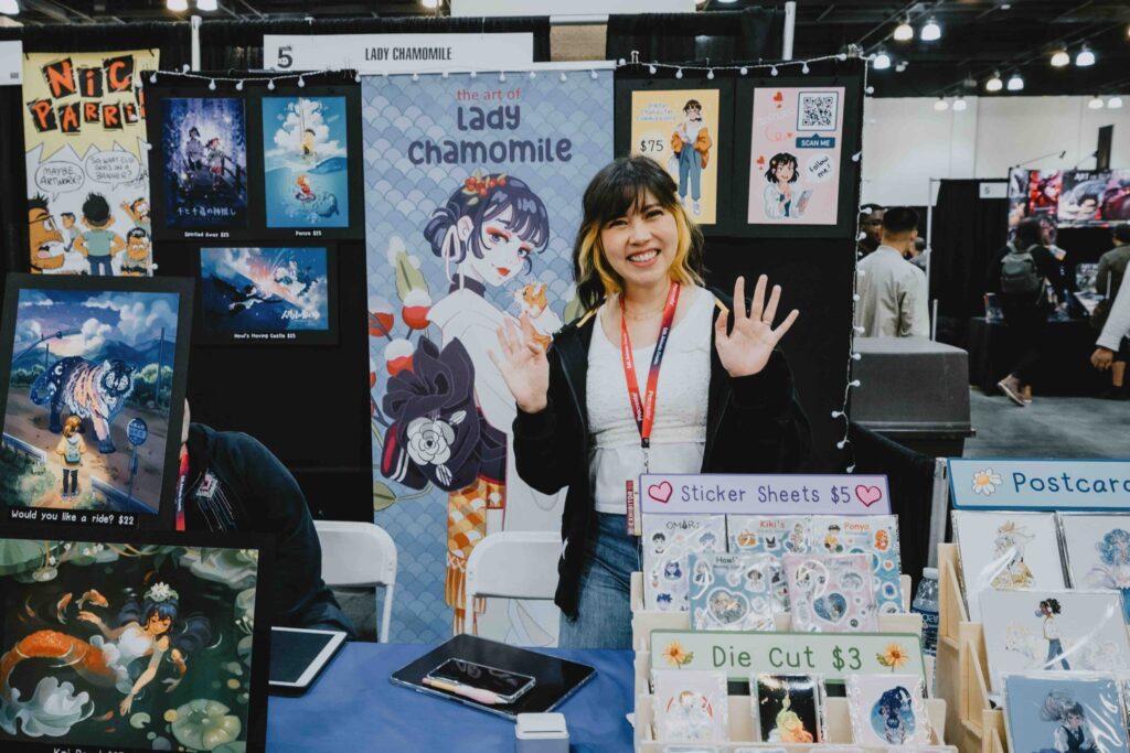 Artist booth with prints at LightBox Expo
