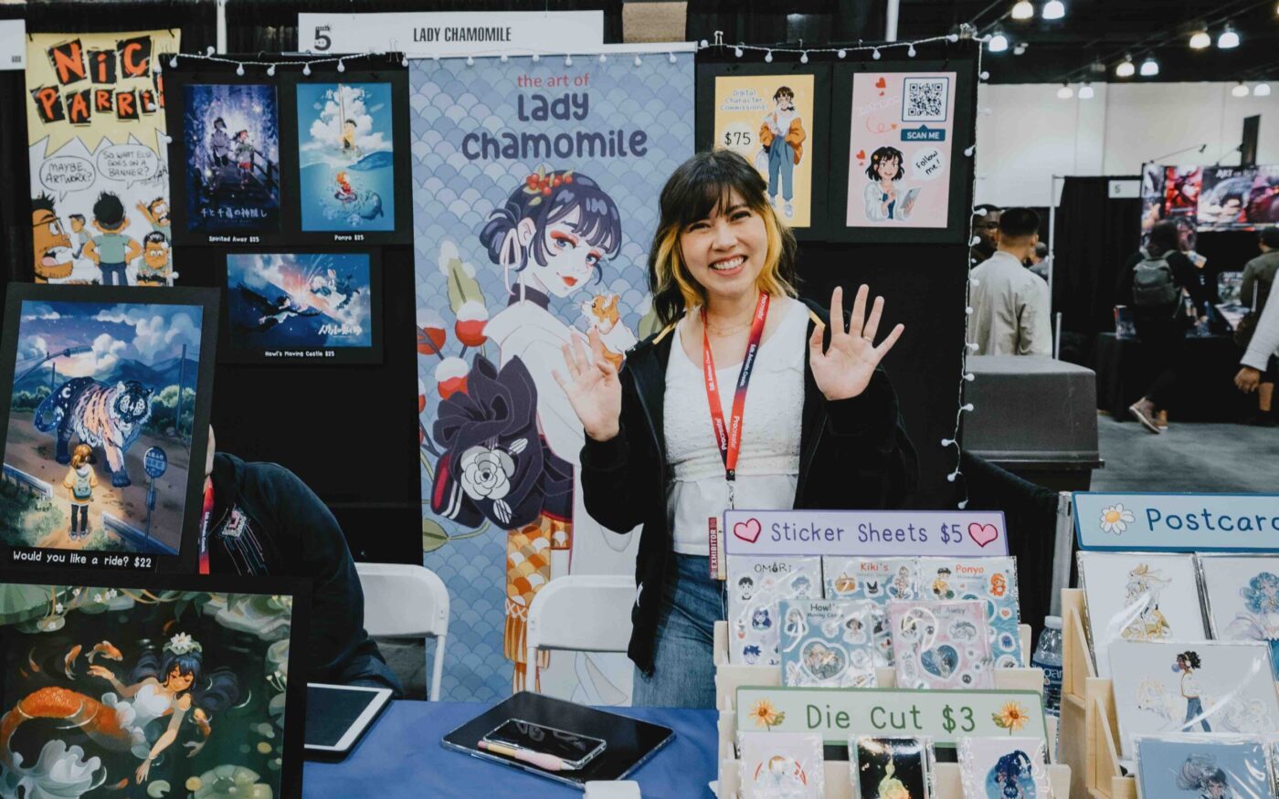 Artist booth with prints at LightBox Expo