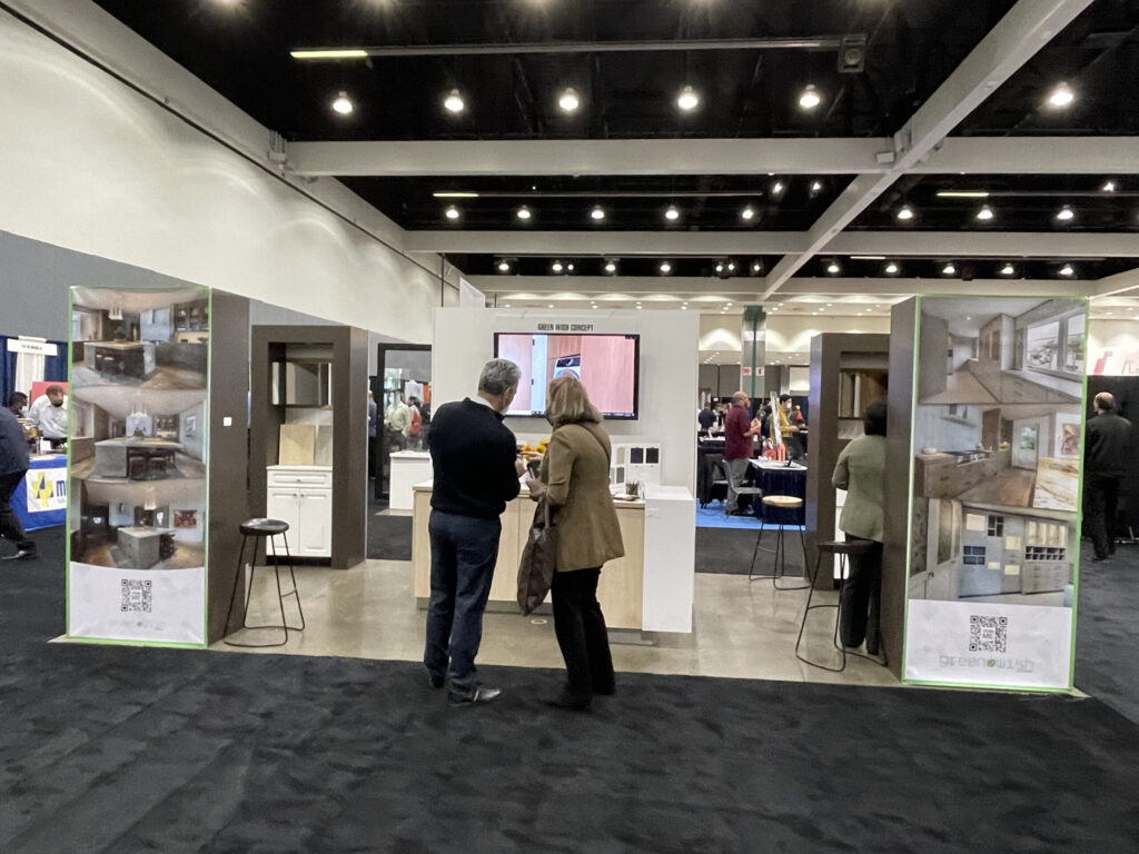 Attendees walking the booth aisle