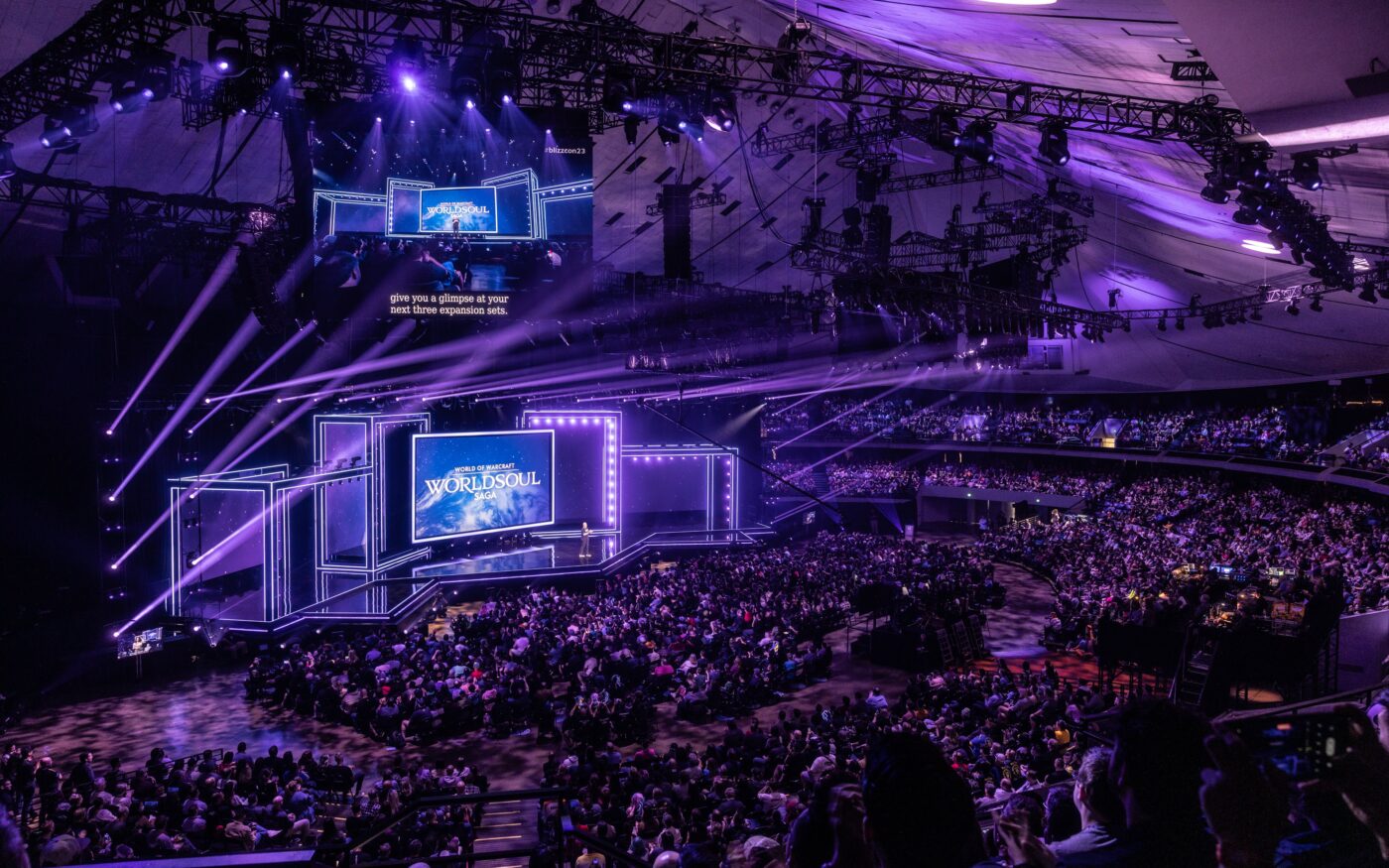 Arena hall with screens and crowd at BlizzCon