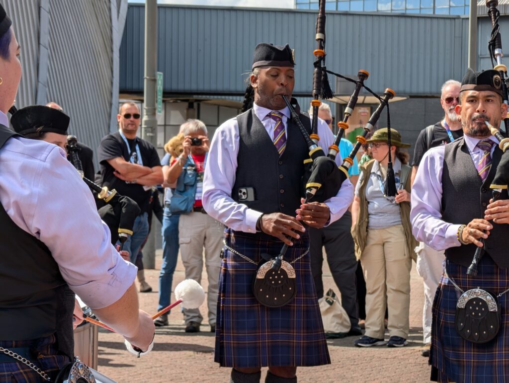 Pipe band performing outside the convention centre