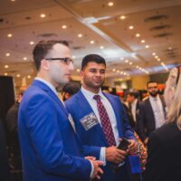Two attendees networking