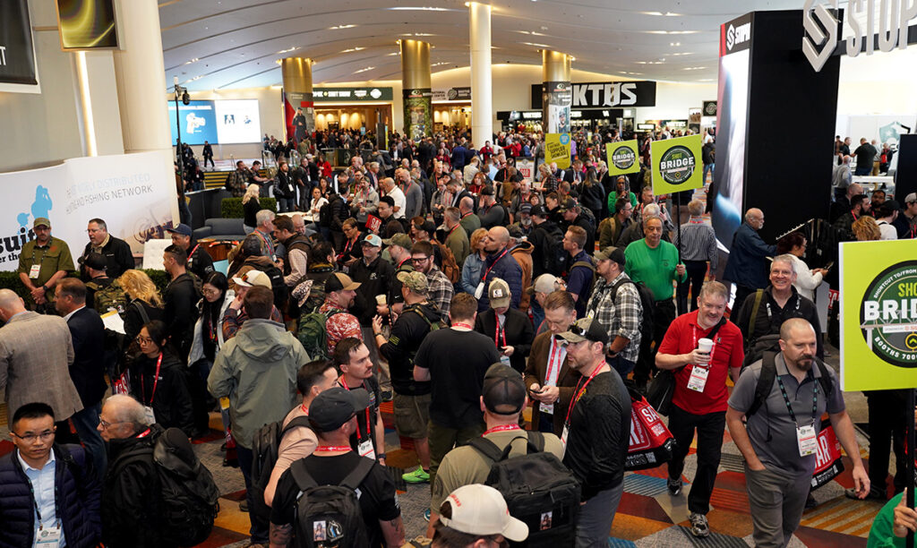 Crowd among SHOT Show exhibitor booths