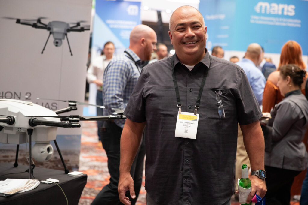 Attendee at a drone display booth