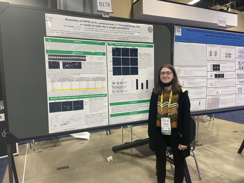Student presenting in the poster hall
