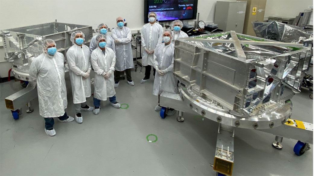 NASA/JPL engineers with Europa Clipper vault hardware in a clean room