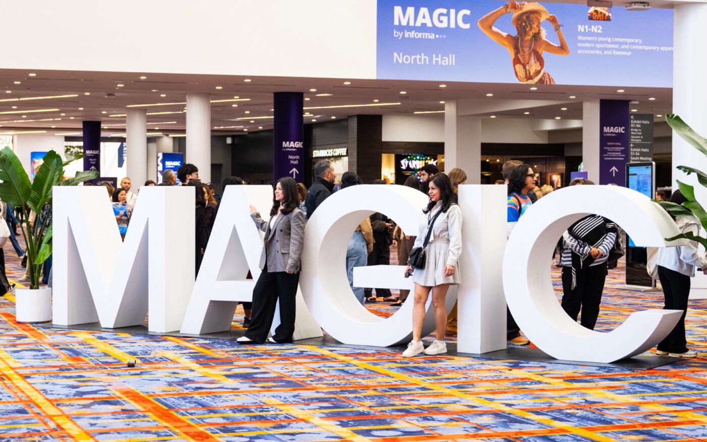 Attendees at the MAGIC by Informa entrance at the Las Vegas Convention Center