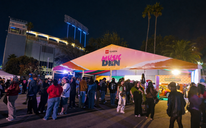 Crowd gathered outside the illuminated Toyota Music Den