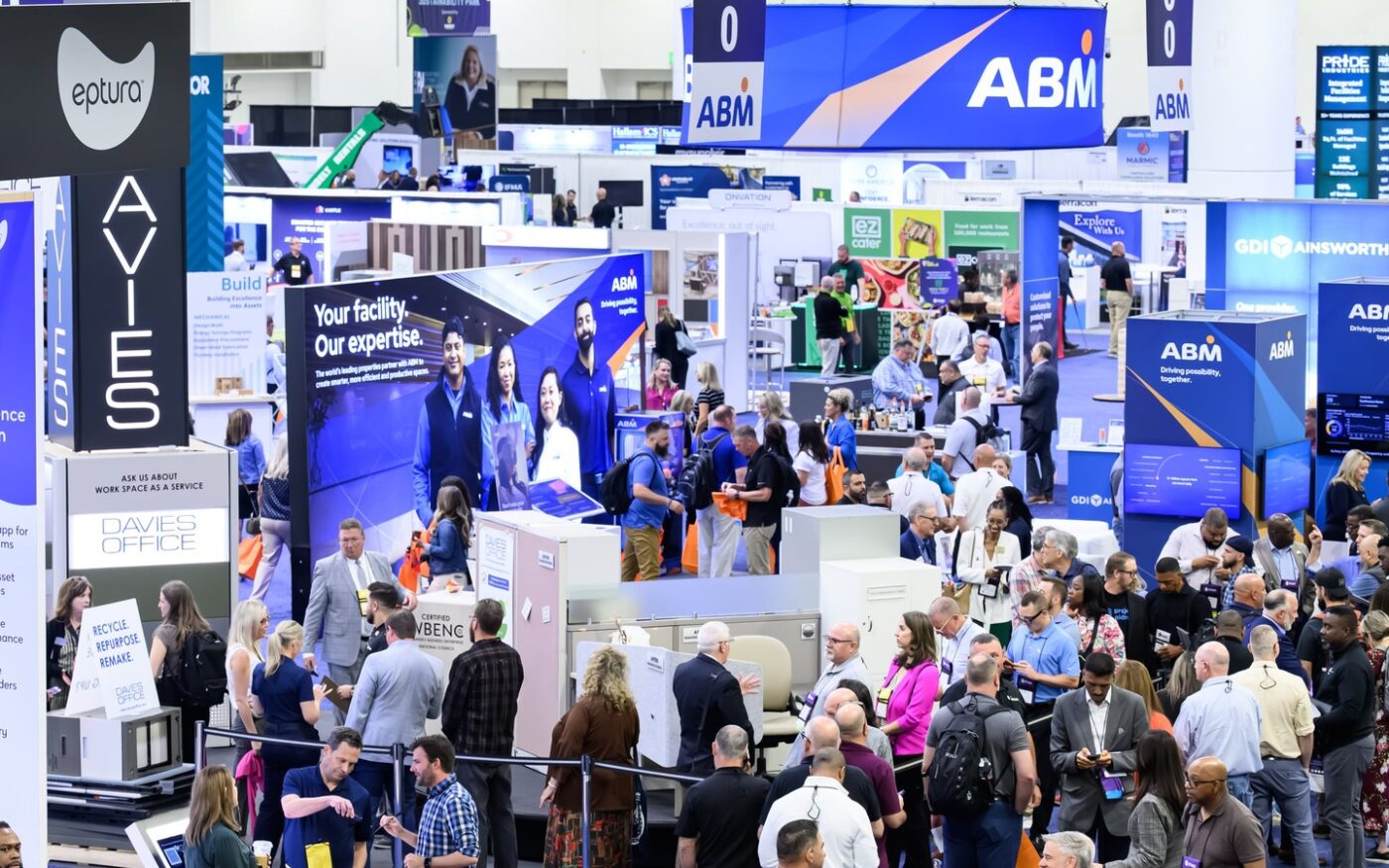 Facility-management exhibitors and attendees on the IFMA World Workplace expo floor