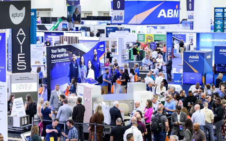 Facility-management exhibitors and attendees on the IFMA World Workplace expo floor