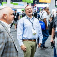 Attendees on the PRINTING United Expo show floor