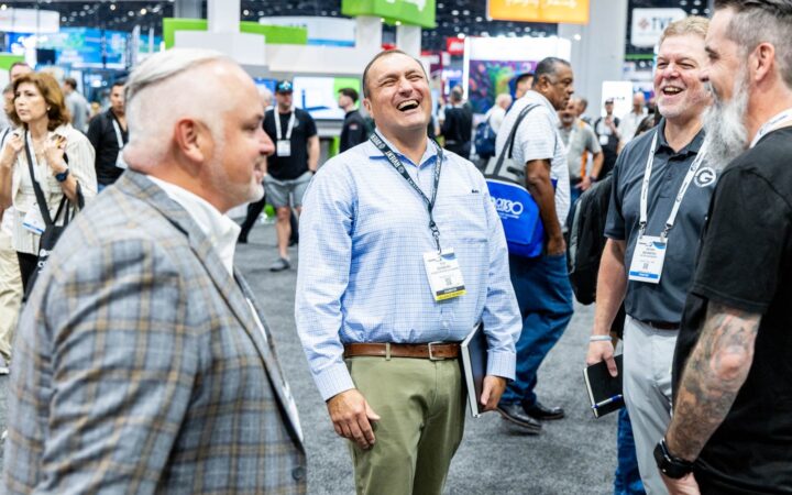 Attendees on the PRINTING United Expo show floor