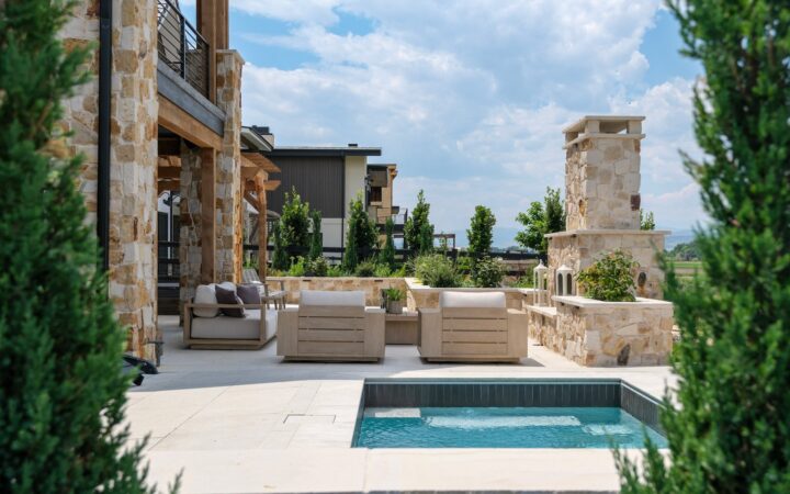 A Soake Pools plunge pool integrated into a landscaped outdoor entertaining space